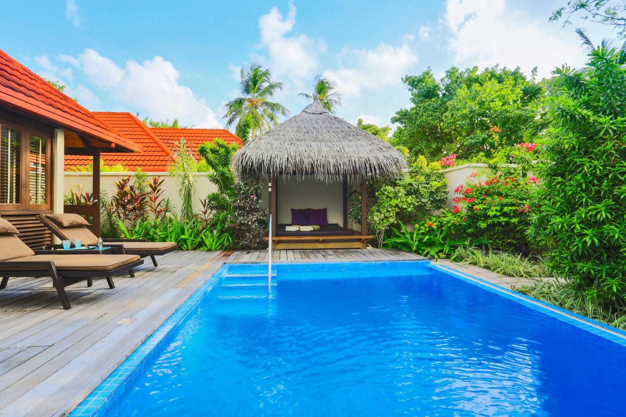 Kurumba Maldives Vihamanaafushi Exterior photo A pool at a resort in Maldives
