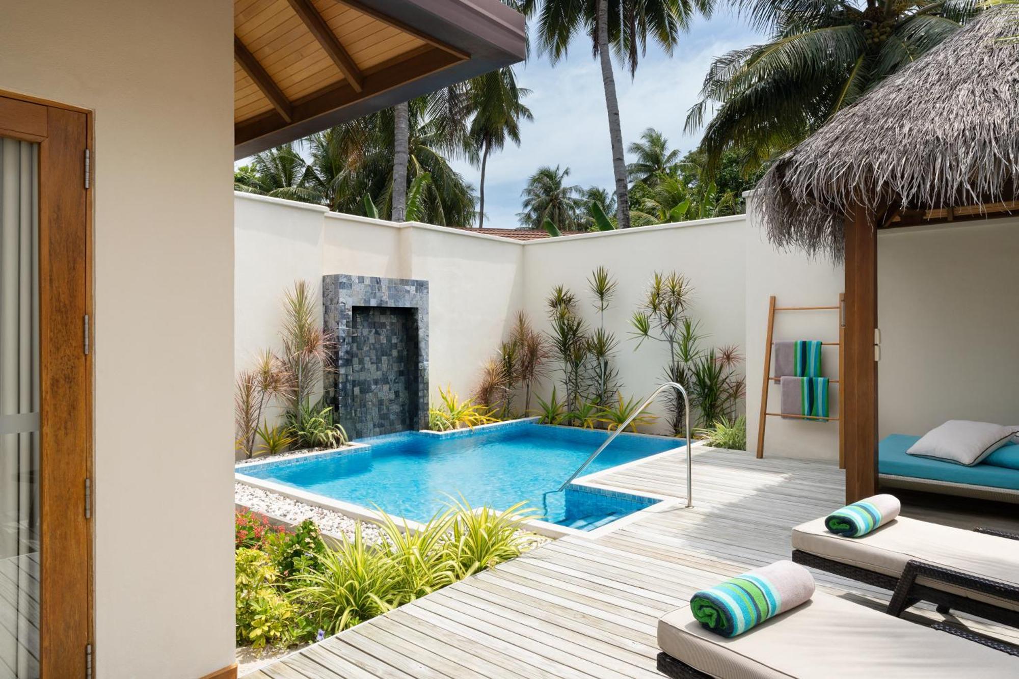 Kurumba Maldives Vihamanaafushi Exterior photo A private pool at a resort in Maldives