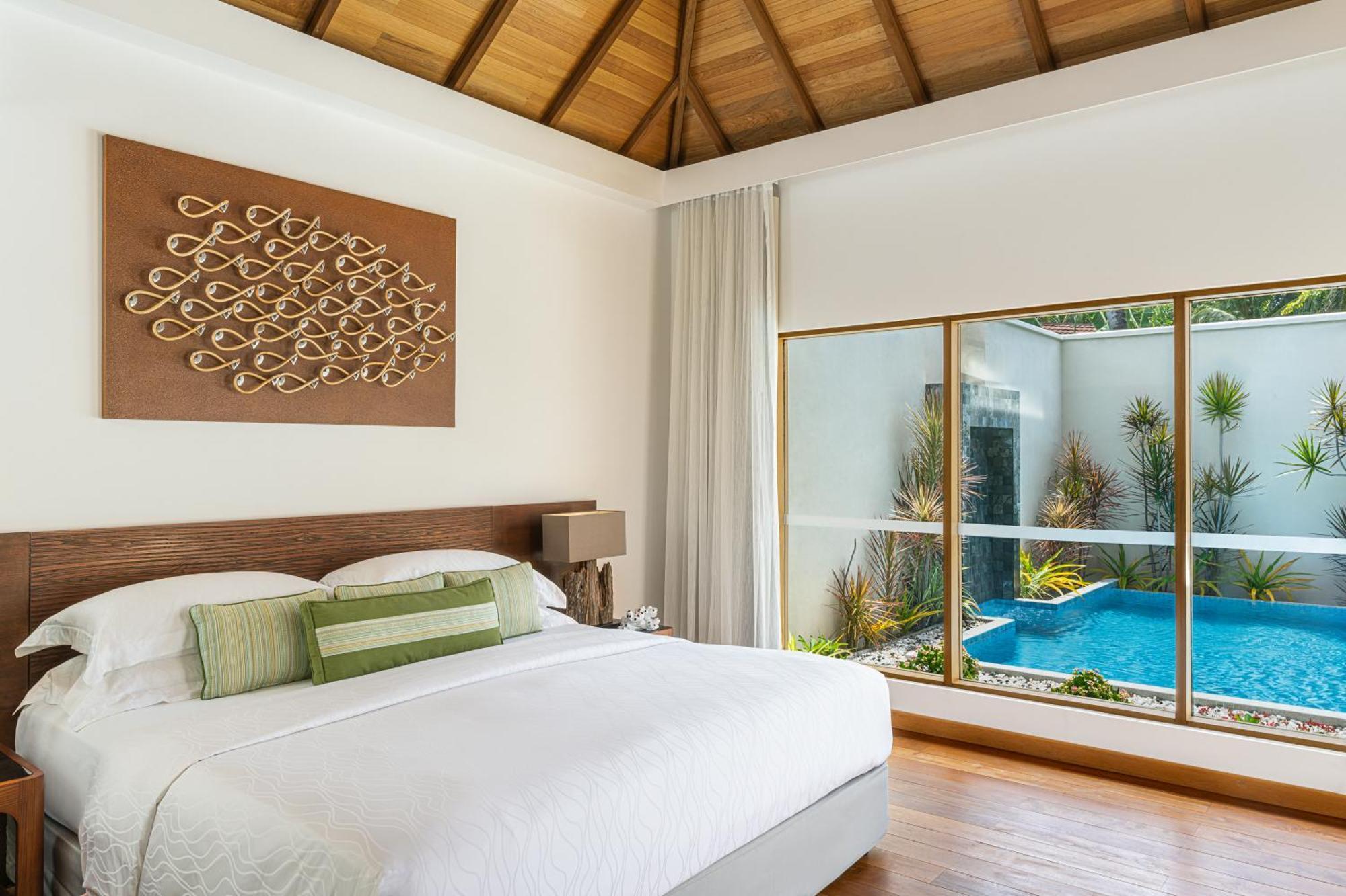 Kurumba Maldives Vihamanaafushi Exterior photo A bedroom at the hotel