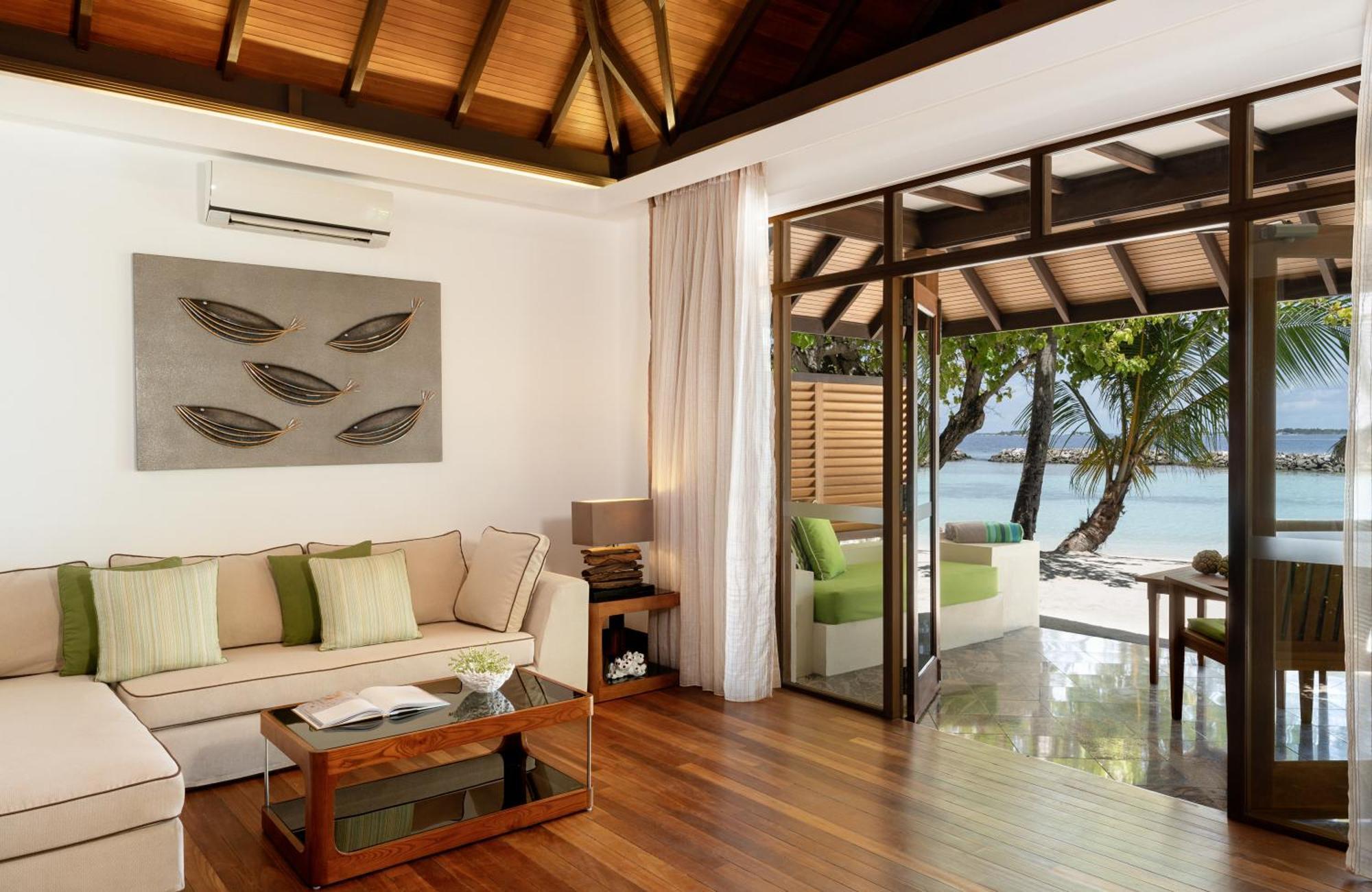 Kurumba Maldives Vihamanaafushi Exterior photo Interior of a beach villa