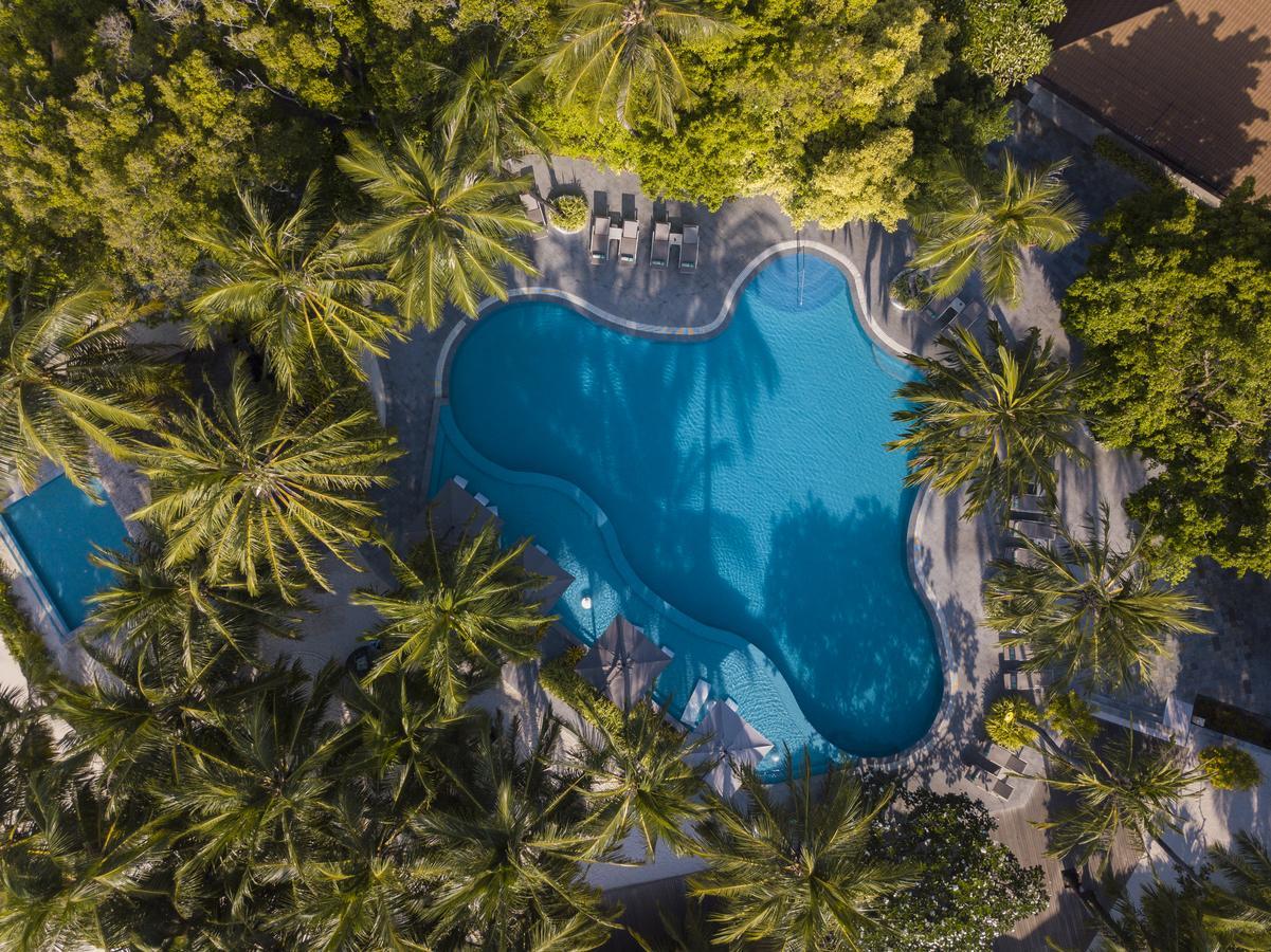 Kurumba Maldives Vihamanaafushi Exterior photo Aerial view of the pool