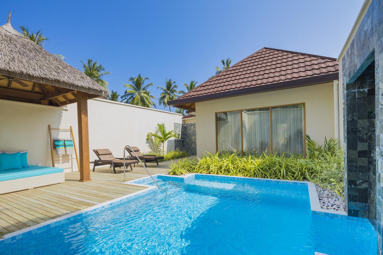 Kurumba Maldives Vihamanaafushi Exterior photo A pool villa at the resort