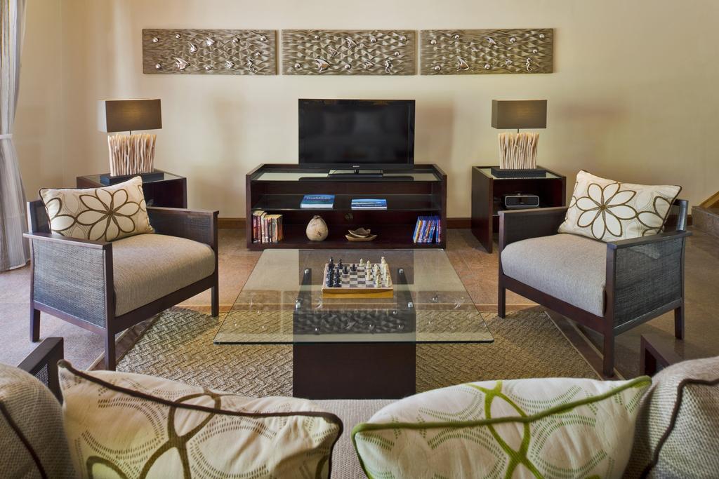 Kurumba Maldives Vihamanaafushi Exterior photo A living room at the Ritz-Carlton, Laguna Beach