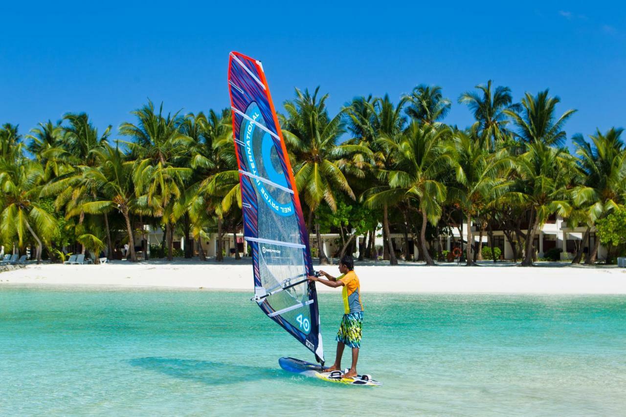 Kurumba Maldives Vihamanaafushi Exterior photo Windsurfer at the beach